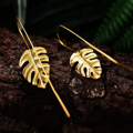 Boucles d'oreilles or feuilles monstres